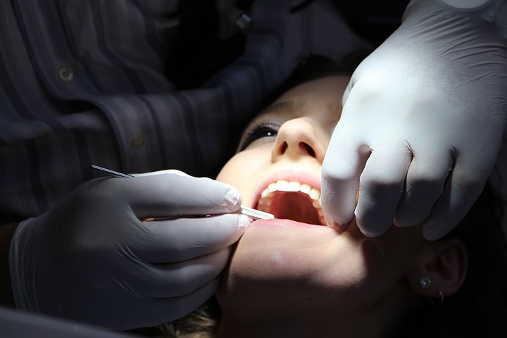 woman getting her teeth checked by an emergency dentist in Lilydale